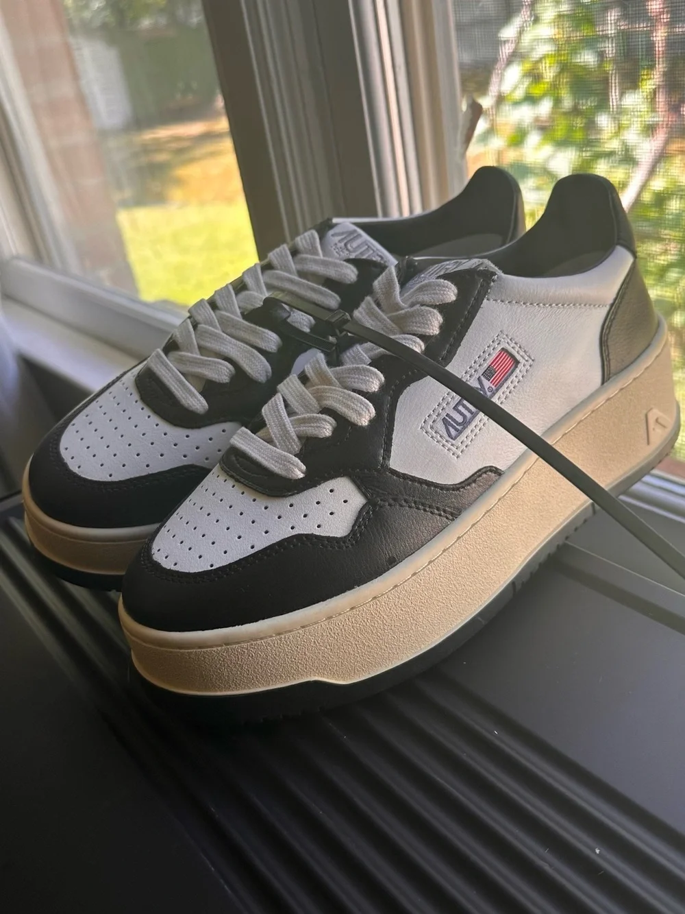 Autry Women's White & Black Platform Sneakers